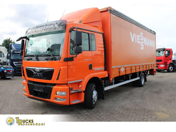 Caminhão com lona MAN TGM 12.250