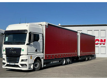Caminhão com lona MAN TGX