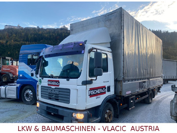 Caminhão com lona MAN TGL 12.240