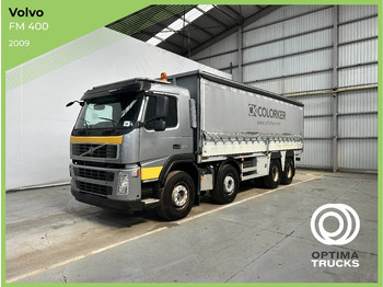 Caminhão com lona VOLVO FM 400