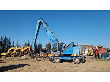 Escavadeira de rodas TEREX