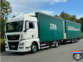 Caminhão com lona MAN TGX 18.440
