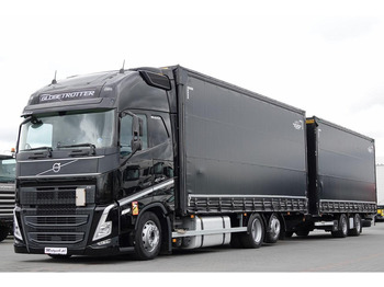 Caminhão com lona VOLVO FH 460