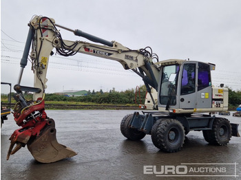 Escavadeira de rodas TEREX