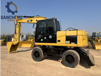 Escavadeira de rodas CATERPILLAR M320