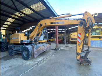 Escavadeira de rodas LIEBHERR A 314