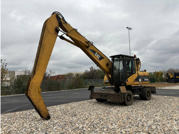 Escavadeira de rodas CATERPILLAR M318