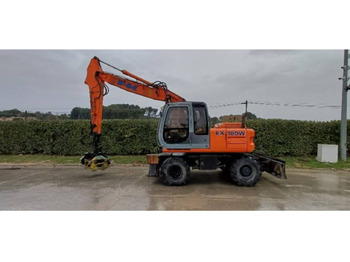 Escavadeira de rodas NEW HOLLAND