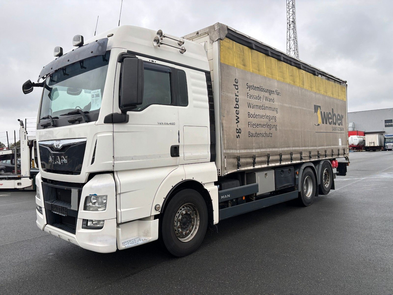 MAN TGX 26.480 mit Ladebordwand - Caminhão com lona: foto 1 MAN TGX 26.480 mit Ladebordwand - Caminhão com lona: foto 1