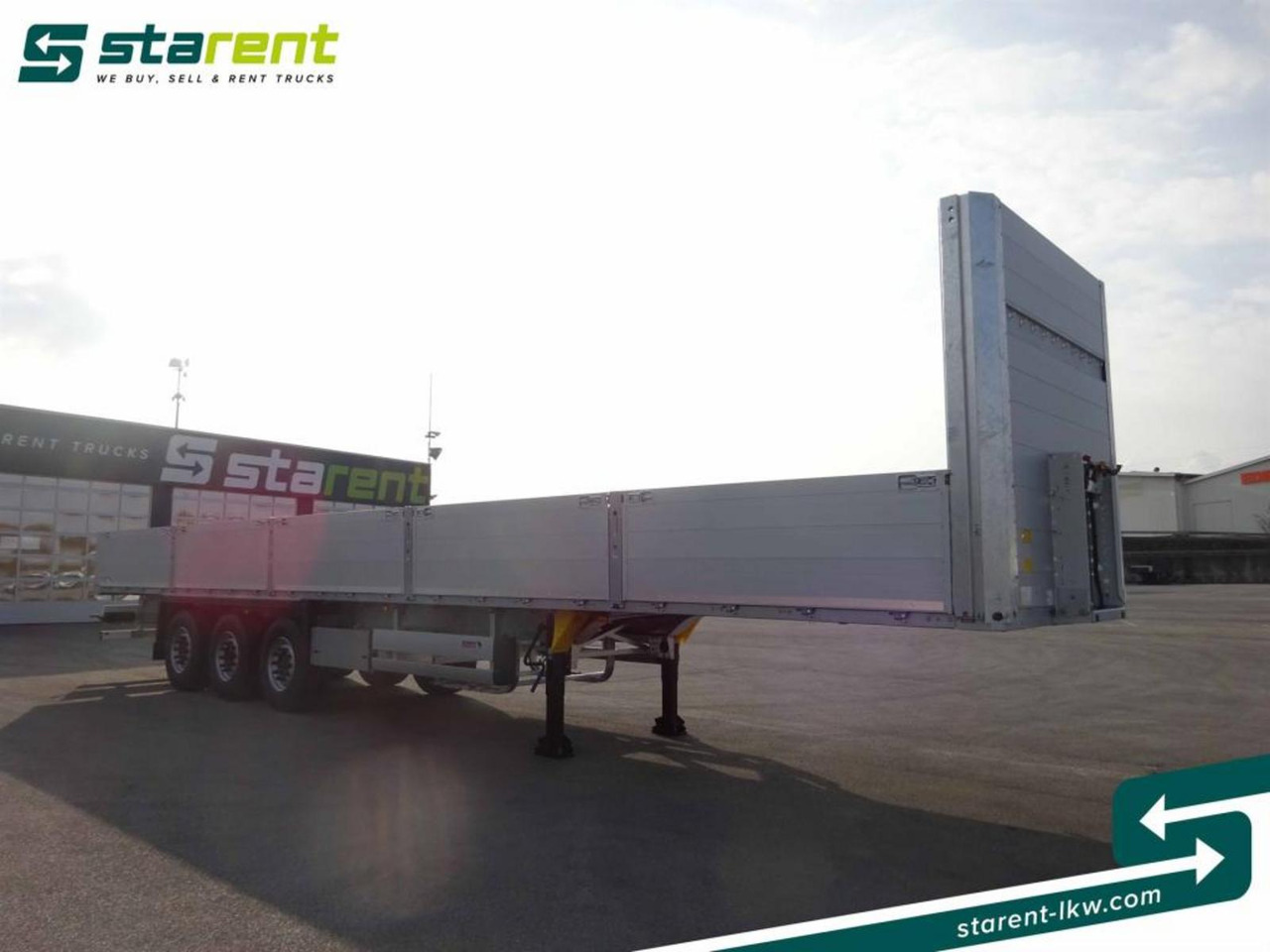 Schmitz Baustofftrailer Liftachse Rungen 80cm Bordwände - Semi-reboque plataforma/ Caixa aberta: foto 3 Schmitz Baustofftrailer Liftachse Rungen 80cm Bordwände - Semi-reboque plataforma/ Caixa aberta: foto 3