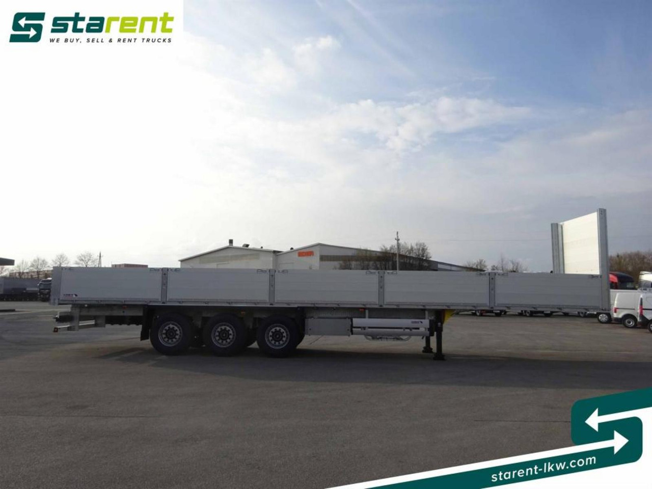 Schmitz Baustofftrailer Liftachse Rungen 80cm Bordwände - Semi-reboque plataforma/ Caixa aberta: foto 4 Schmitz Baustofftrailer Liftachse Rungen 80cm Bordwände - Semi-reboque plataforma/ Caixa aberta: foto 4