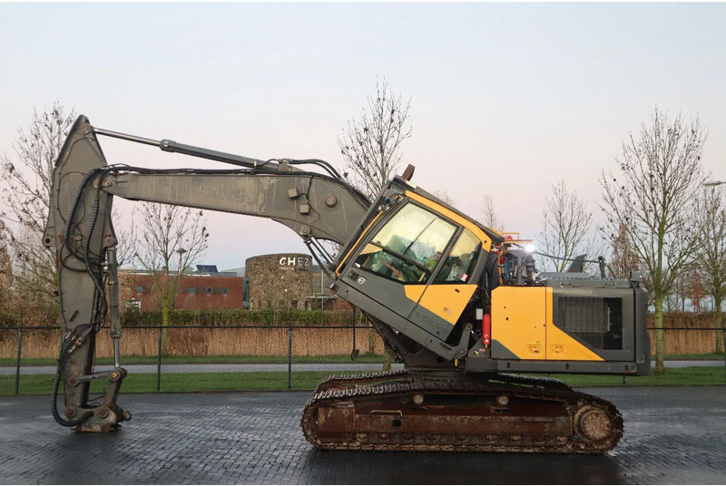 Volvo EC 250 EL | OILQUICK | DYNASET | TILT CABIN - Escavadora de rastos: foto 1 Volvo EC 250 EL | OILQUICK | DYNASET | TILT CABIN - Escavadora de rastos: foto 1