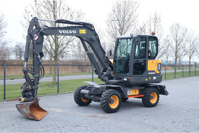 Volvo EW 60 E | DEMO | 30 KM/H | ROTOTILT + GRIPPER | BUCKET - Escavadeira de rodas: foto 2 Volvo EW 60 E | DEMO | 30 KM/H | ROTOTILT + GRIPPER | BUCKET - Escavadeira de rodas: foto 2