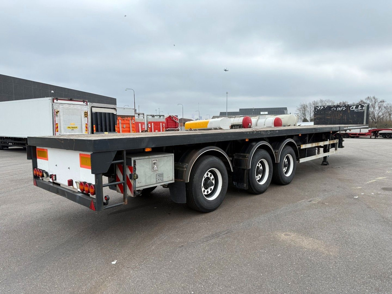 Lag 3 axle 7 m. Extendable / Last Axle Steering - Semi-reboque plataforma/ Caixa aberta: foto 3 Lag 3 axle 7 m. Extendable / Last Axle Steering - Semi-reboque plataforma/ Caixa aberta: foto 3