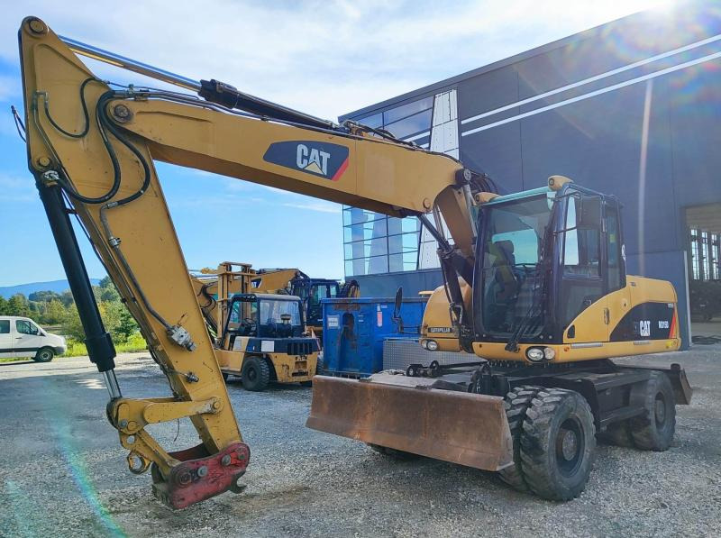 Caterpillar M315D - Escavadeira de rodas: foto 2 Caterpillar M315D - Escavadeira de rodas: foto 2
