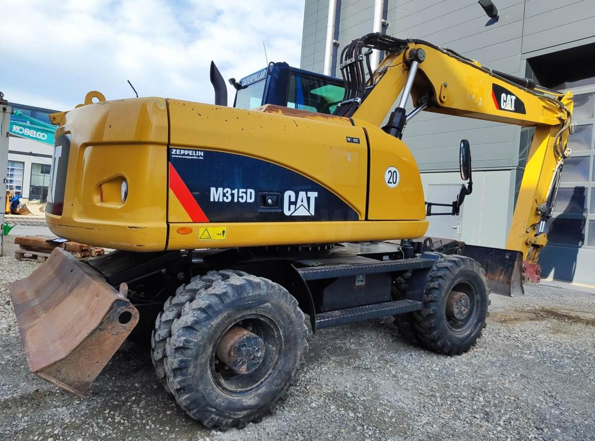 Caterpillar M315D - Escavadeira de rodas: foto 4 Caterpillar M315D - Escavadeira de rodas: foto 4
