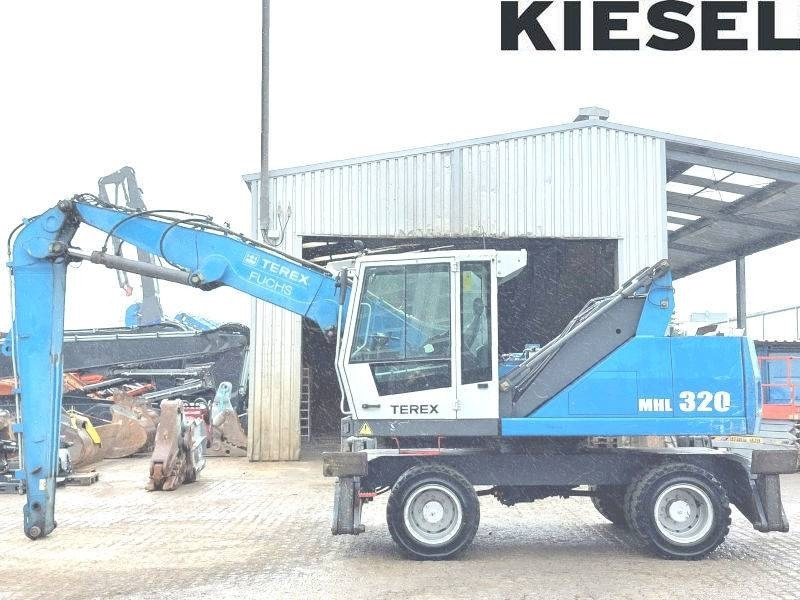 Fuchs MHL 320 D - Manipulador de material: foto 1 Fuchs MHL 320 D - Manipulador de material: foto 1