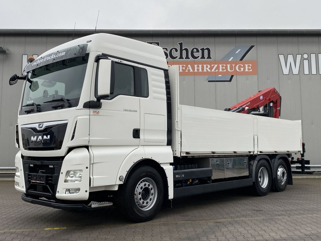 MAN TGX 26.500 6x2-4 LL | HMF 2110-Kran*XLX*Navi*AHK - Camião de caixa aberta/ Plataforma, Caminhão grua: foto 1 MAN TGX 26.500 6x2-4 LL | HMF 2110-Kran*XLX*Navi*AHK - Camião de caixa aberta/ Plataforma, Caminhão grua: foto 1