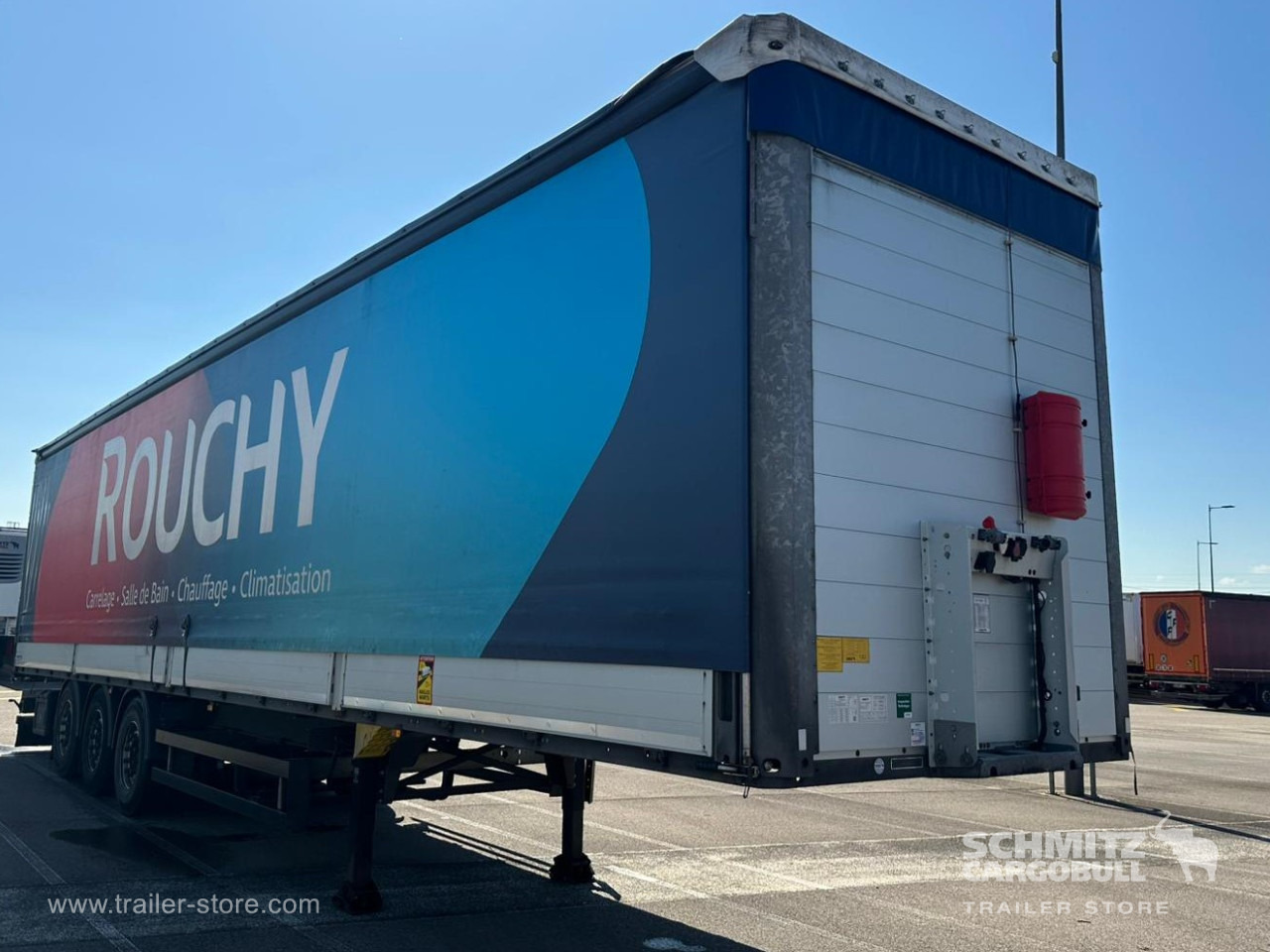 SCHMITZ Curtainsider Dropside - Semi-reboque de lona: foto 1 SCHMITZ Curtainsider Dropside - Semi-reboque de lona: foto 1