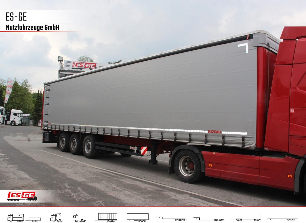 Kögel 3-Achs-Cargo-Coil-Pritschensattelanhänger Kögel 3-Achs-Cargo-Coil-Pritschensattelanhänger - Semi-reboque de lona: foto 2 Kögel 3-Achs-Cargo-Coil-Pritschensattelanhänger Kögel 3-Achs-Cargo-Coil-Pritschensattelanhänger - Semi-reboque de lona: foto 2