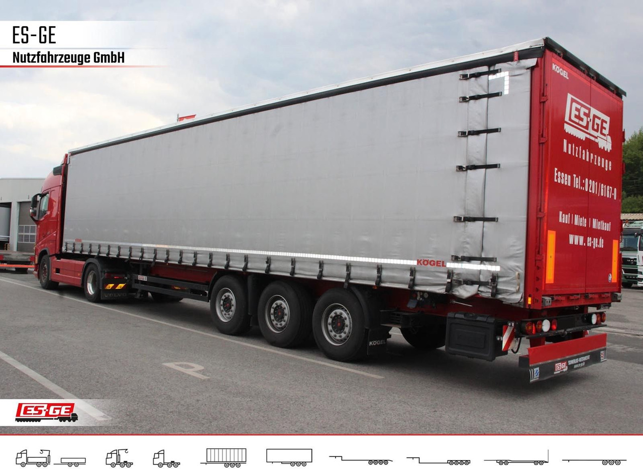 Kögel 3-Achs-Cargo-Coil-Pritschensattelanhänger Kögel 3-Achs-Cargo-Coil-Pritschensattelanhänger - Semi-reboque de lona: foto 1 Kögel 3-Achs-Cargo-Coil-Pritschensattelanhänger Kögel 3-Achs-Cargo-Coil-Pritschensattelanhänger - Semi-reboque de lona: foto 1
