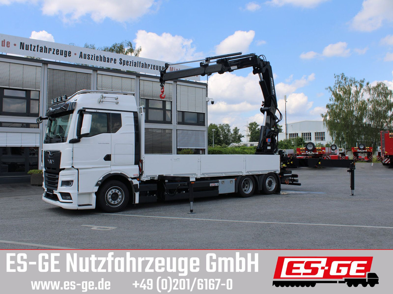 MAN TGX 26.480 6x2-4 LL CH mit MKG HLK531 a5 - Camião de caixa aberta/ Plataforma, Caminhão grua: foto 1 MAN TGX 26.480 6x2-4 LL CH mit MKG HLK531 a5 - Camião de caixa aberta/ Plataforma, Caminhão grua: foto 1