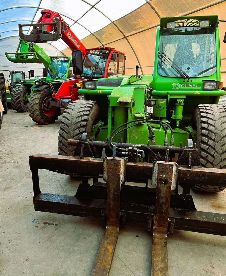 Merlo P38.10 Turbo Farmer - Empilhador telescópico: foto 1 Merlo P38.10 Turbo Farmer - Empilhador telescópico: foto 1