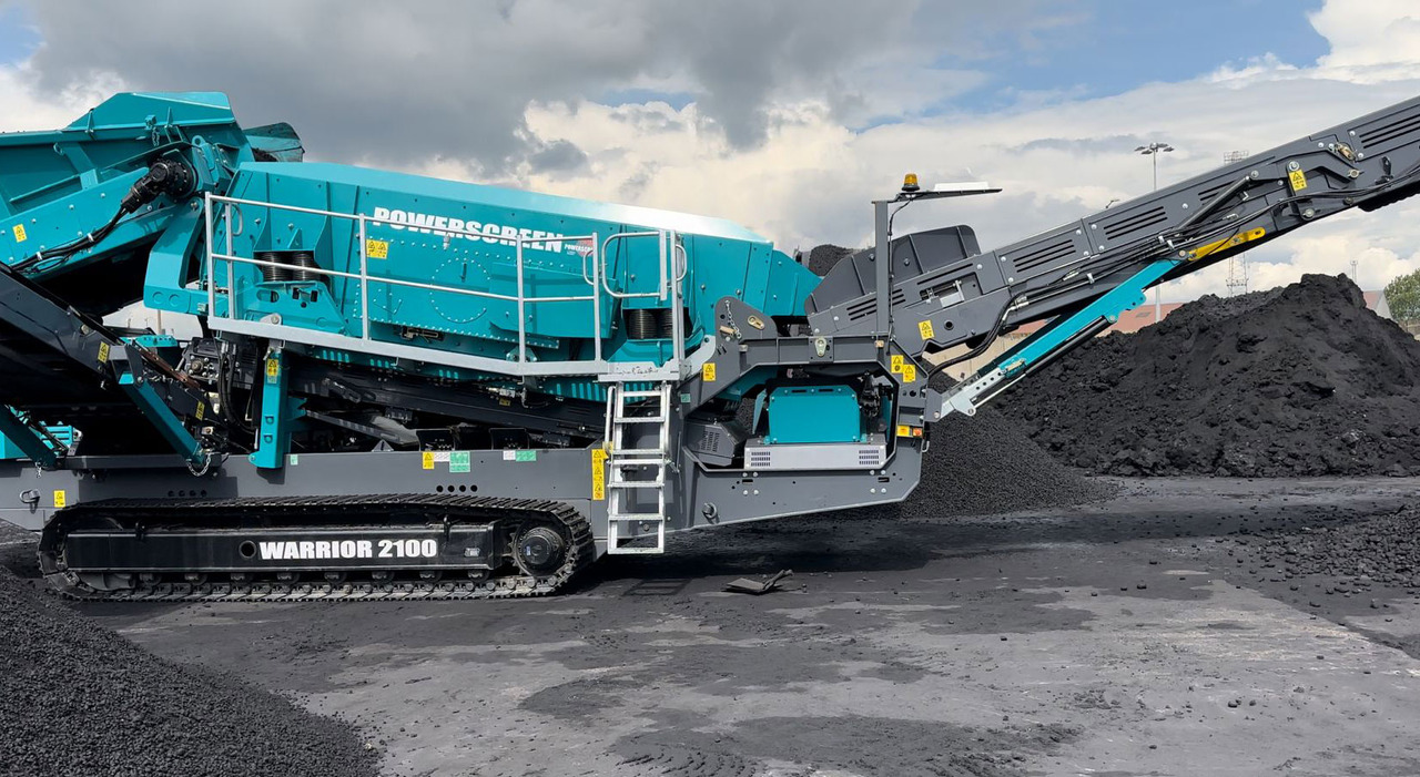 Powerscreen Warrior 2100 Triple Shaft - Peneira vibratória: foto 1 Powerscreen Warrior 2100 Triple Shaft - Peneira vibratória: foto 1
