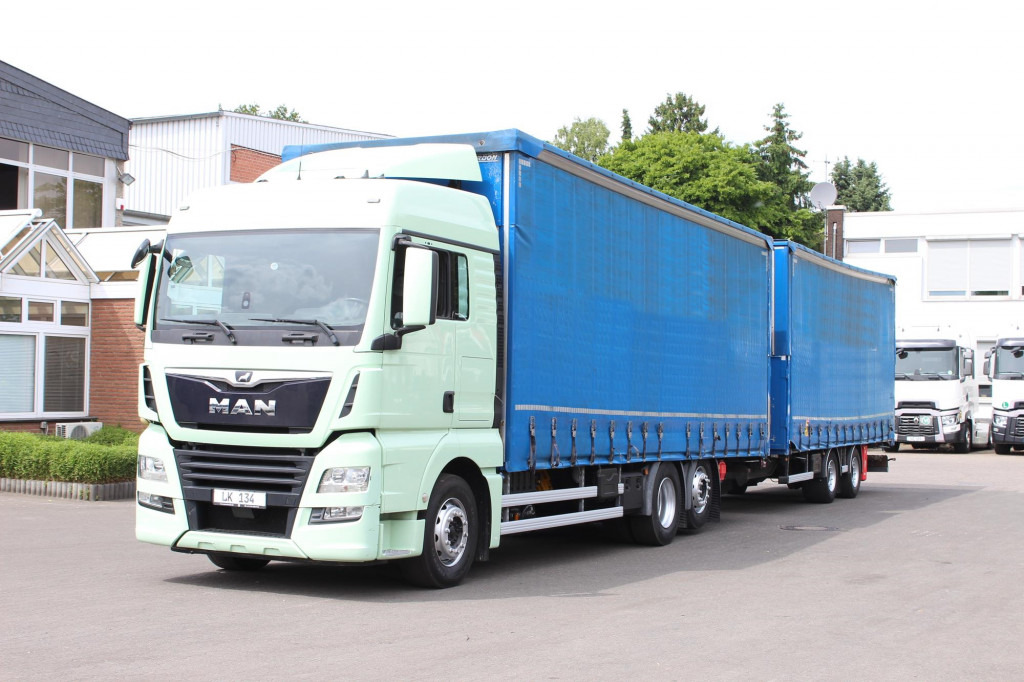 MAN TGX 26.460 Retarder Jumbo-Zug 120M3 Durchlade - Caminhão com lona: foto 1 MAN TGX 26.460 Retarder Jumbo-Zug 120M3 Durchlade - Caminhão com lona: foto 1
