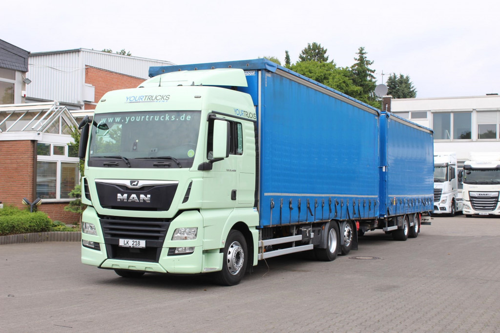 MAN TGX 26.460 Retarder Jumbo-Zug 120M3 Durchlade - Caminhão com lona: foto 1 MAN TGX 26.460 Retarder Jumbo-Zug 120M3 Durchlade - Caminhão com lona: foto 1
