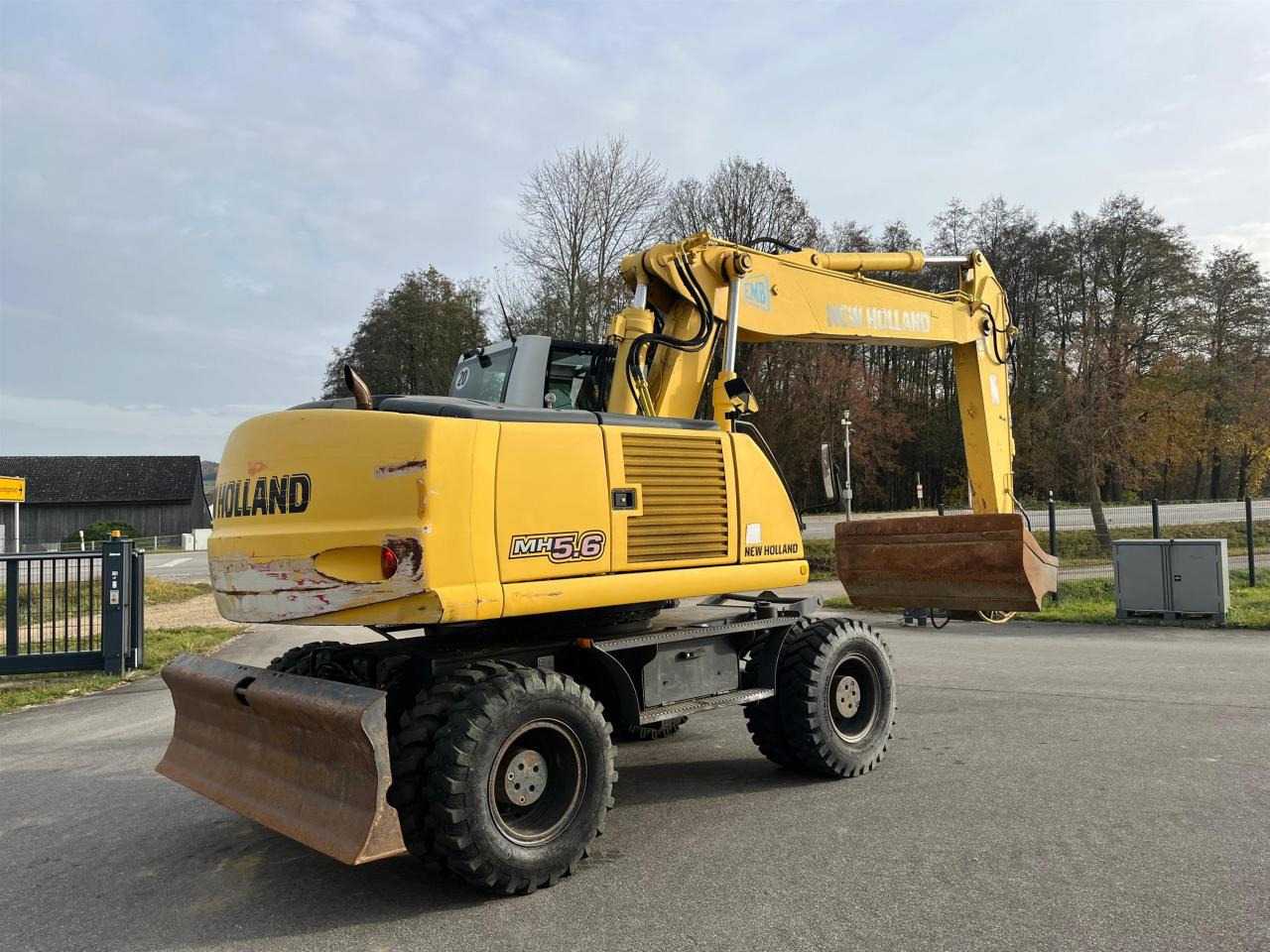 New Holland MH 5.6 inkl. Grabenlöffel, Tieflöffel - Escavadeira de rodas: foto 5 New Holland MH 5.6 inkl. Grabenlöffel, Tieflöffel - Escavadeira de rodas: foto 5