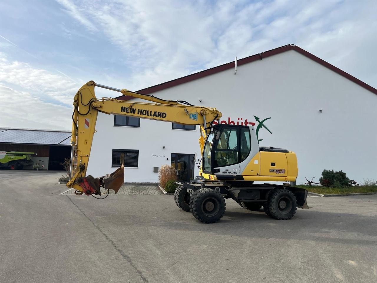 New Holland MH 5.6 inkl. Grabenlöffel, Tieflöffel - Escavadeira de rodas: foto 3 New Holland MH 5.6 inkl. Grabenlöffel, Tieflöffel - Escavadeira de rodas: foto 3