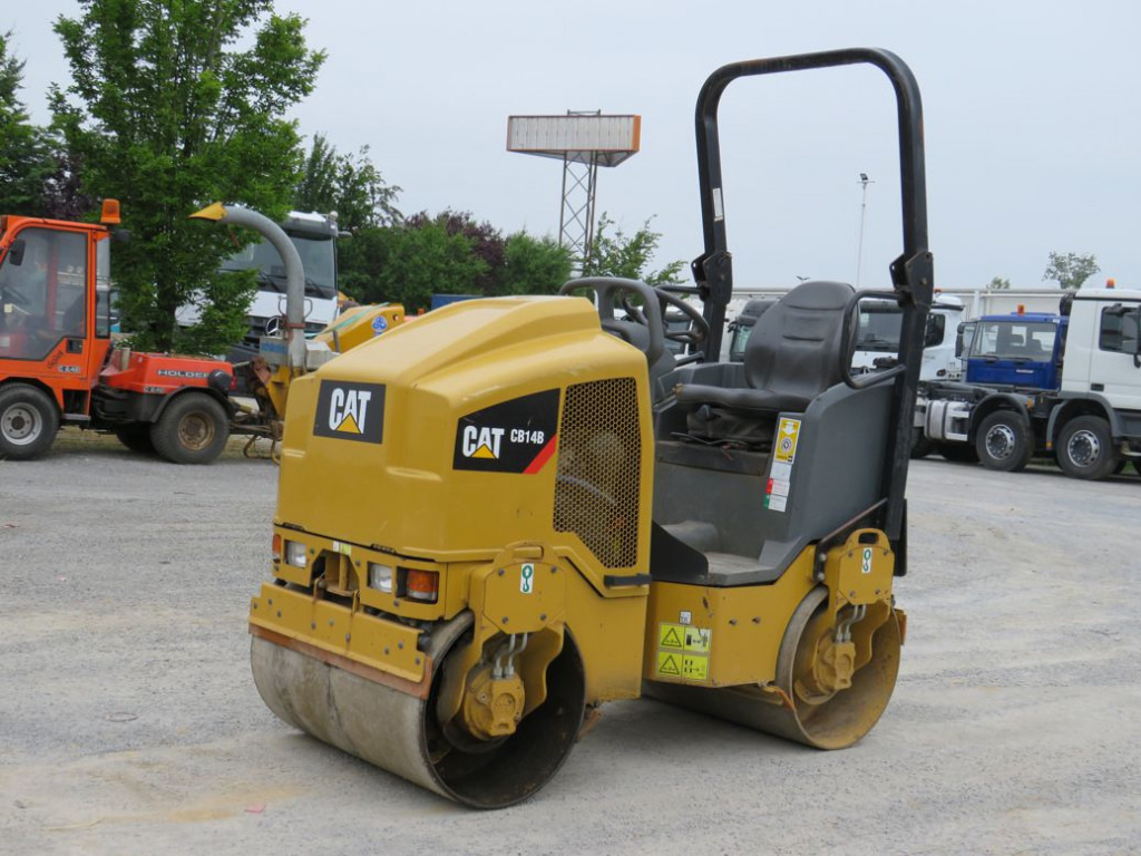 CATERPILLAR Tandem-Vibrationswalze CB14 B Baumaschine - Rolo: foto 1 CATERPILLAR Tandem-Vibrationswalze CB14 B Baumaschine - Rolo: foto 1