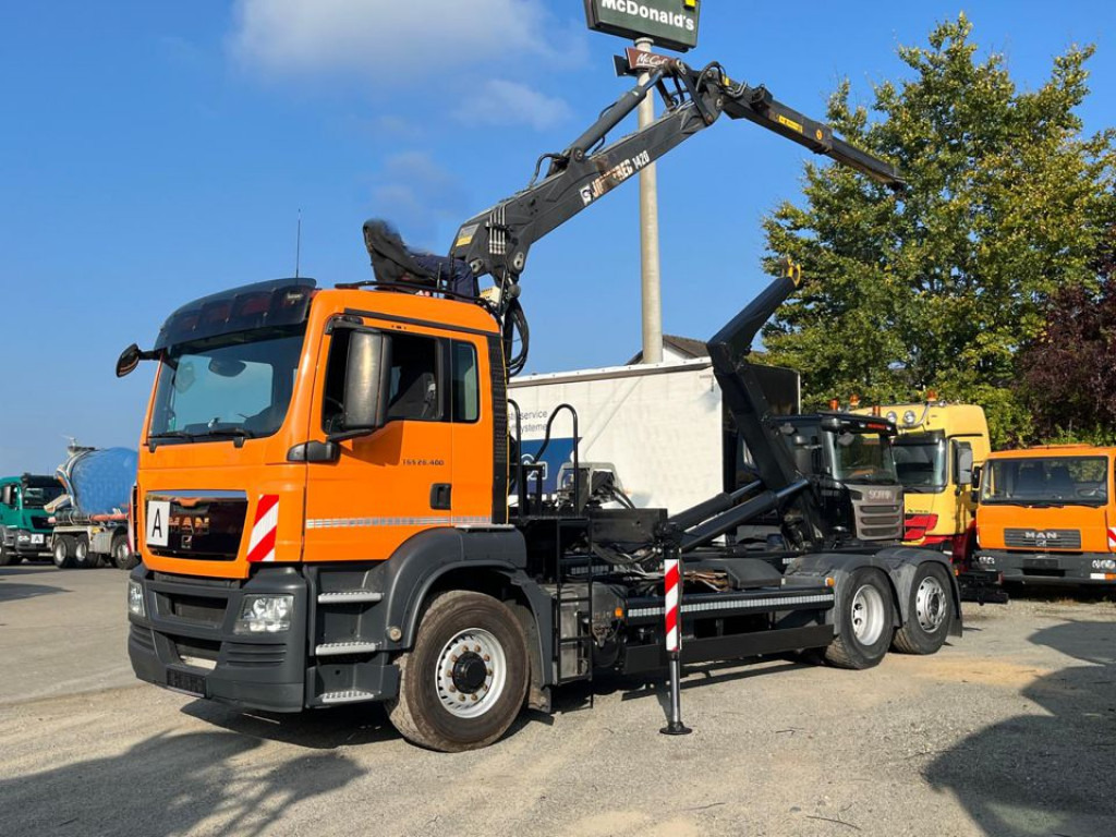 MAN TG-S 26.400 6x4H-2 BL Abrollkipper mit Kran Lift Lenk - Caminhão polibenne, Caminhão grua: foto 1 MAN TG-S 26.400 6x4H-2 BL Abrollkipper mit Kran Lift Lenk - Caminhão polibenne, Caminhão grua: foto 1