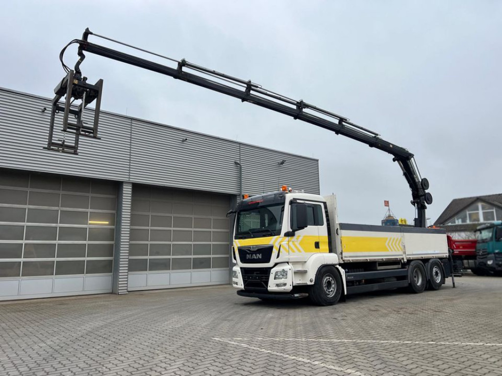 MAN TG-S Pritsche Heckkran 26.400 6x2-2 BL 5xhydr, faltbar, Hiab 192 E - 5 / Funk - Camião de caixa aberta/ Plataforma, Caminhão grua: foto 1 MAN TG-S Pritsche Heckkran 26.400 6x2-2 BL 5xhydr, faltbar, Hiab 192 E - 5 / Funk - Camião de caixa aberta/ Plataforma, Caminhão grua: foto 1