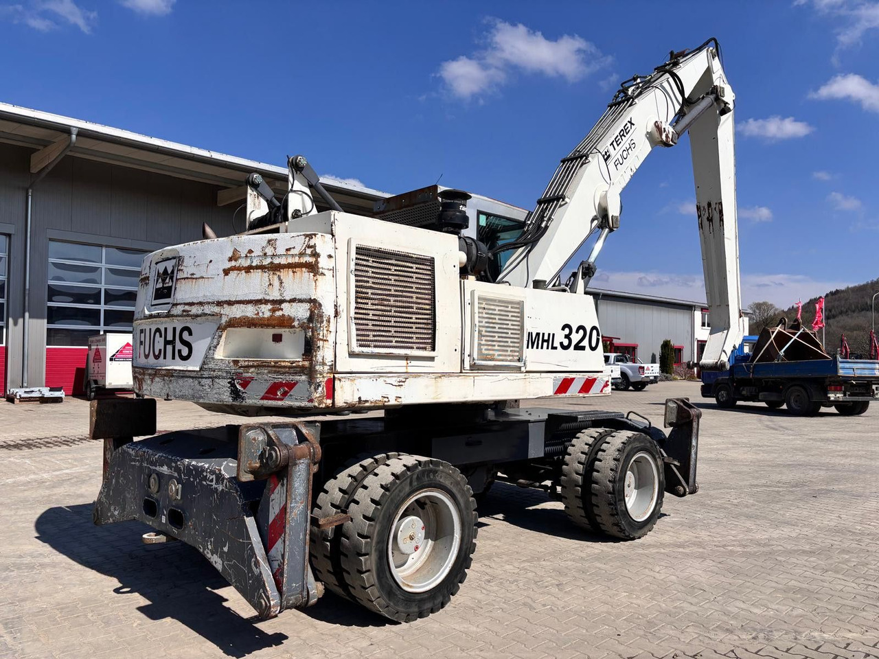 Fuchs MHL 320 - Escavadeira de rodas: foto 4 Fuchs MHL 320 - Escavadeira de rodas: foto 4