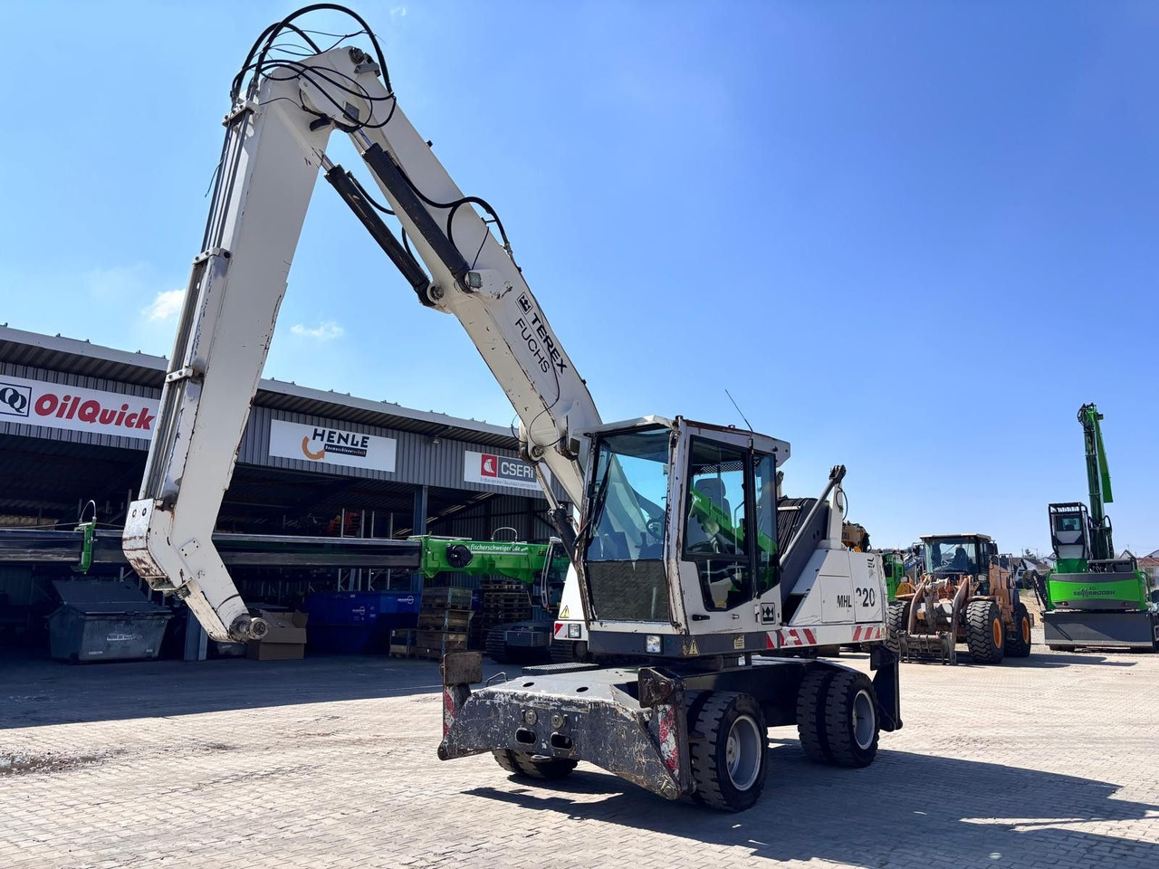 Fuchs MHL 320 - Escavadeira de rodas: foto 1 Fuchs MHL 320 - Escavadeira de rodas: foto 1