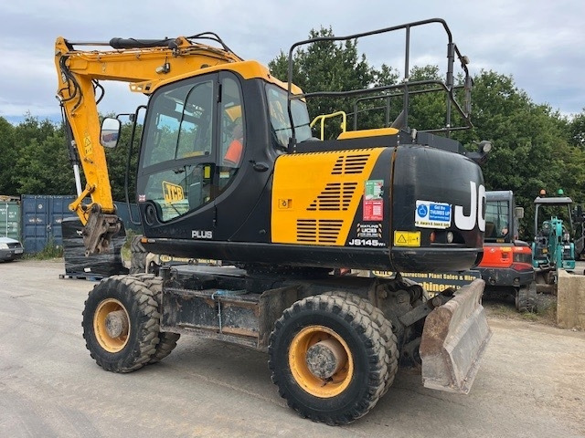 Escavadeira de rodas JCB JS 145 W: foto 9