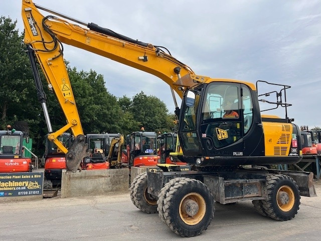 Escavadeira de rodas JCB JS 145 W: foto 7
