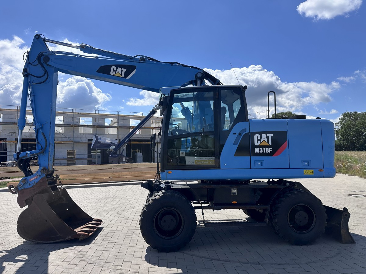 CATERPILLAR M 318 F Oil Quick OQ 65 Deutsche Maschine Top ! - Escavadeira de rodas: foto 1 CATERPILLAR M 318 F Oil Quick OQ 65 Deutsche Maschine Top ! - Escavadeira de rodas: foto 1
