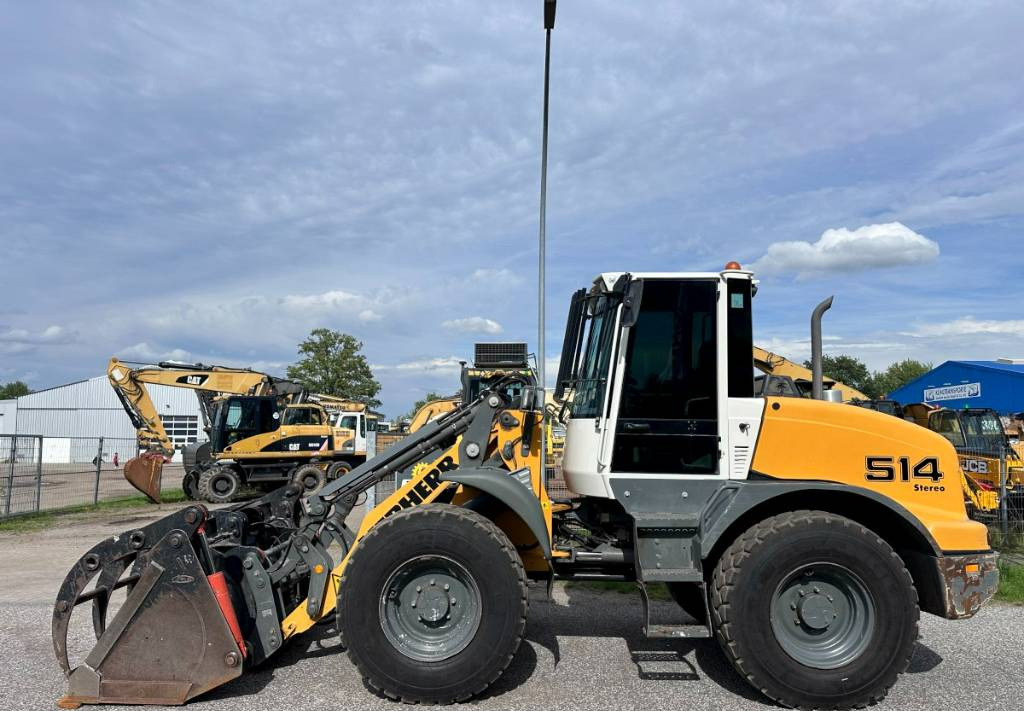 Liebherr L 514 Stereo +30 Kmh Klima 3er Kreis Greifschaufel - Carregadeira de rodas: foto 1 Liebherr L 514 Stereo +30 Kmh Klima 3er Kreis Greifschaufel - Carregadeira de rodas: foto 1