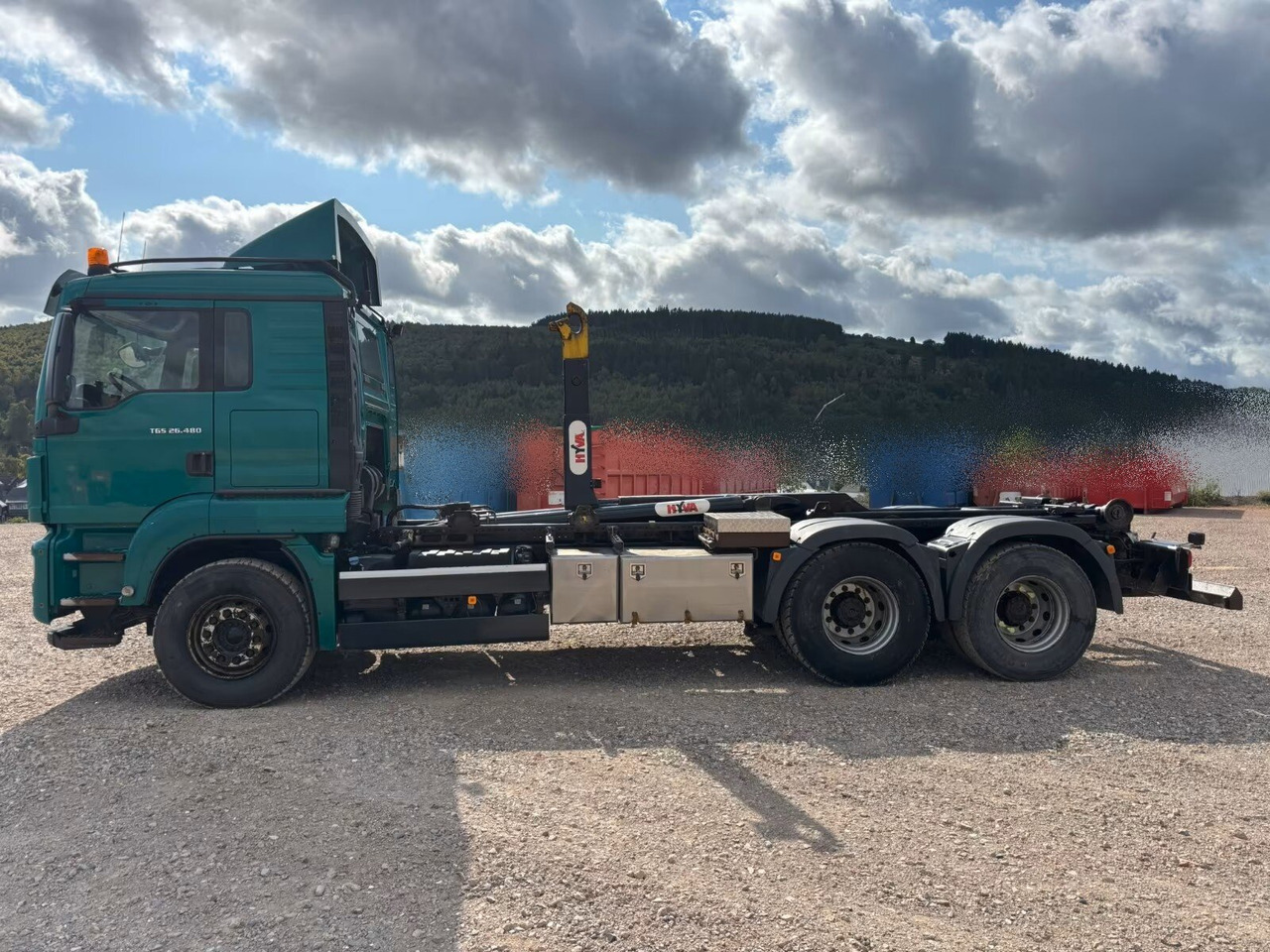MAN TGS 26.480 6x4/45 BL TGS 26.480 6x4/45 BL, Klima, Intarder, Hyva 20.60 S bis 7 m Container, - Caminhão polibenne: foto 1 MAN TGS 26.480 6x4/45 BL TGS 26.480 6x4/45 BL, Klima, Intarder, Hyva 20.60 S bis 7 m Container, - Caminhão polibenne: foto 1