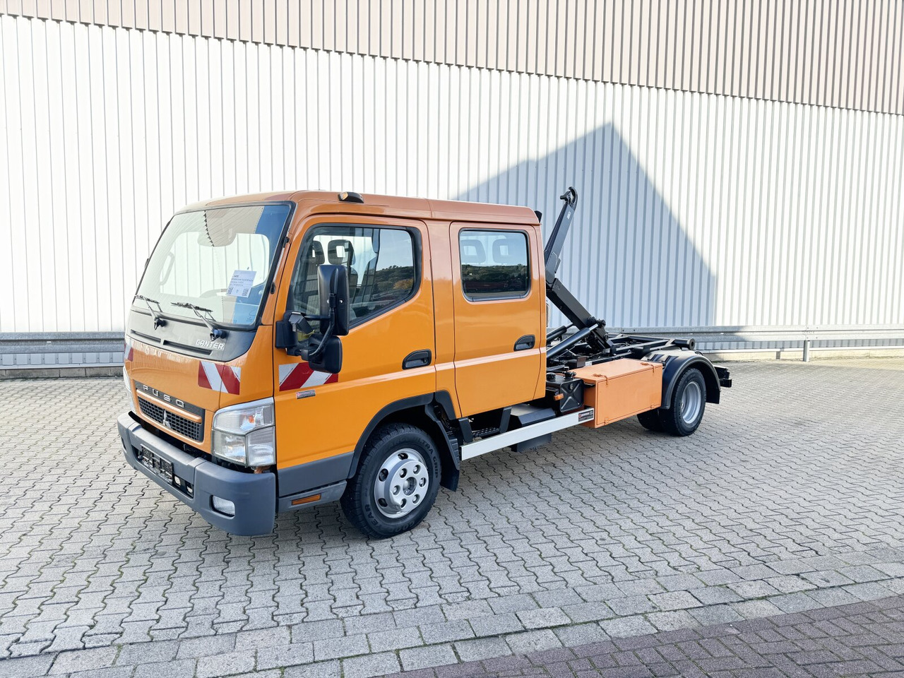 Mitsubishi Canter Fuso 6C15D 4x2 Doka Canter Fuso 6C15D 4x2 Doka, City-Abroller - Caminhão polibenne: foto 1 Mitsubishi Canter Fuso 6C15D 4x2 Doka Canter Fuso 6C15D 4x2 Doka, City-Abroller - Caminhão polibenne: foto 1