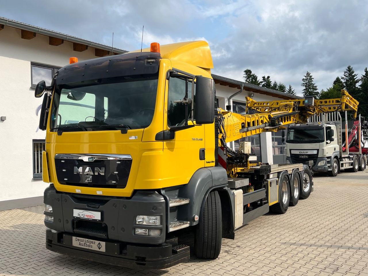 MAN TGS 35.480 8x4-4BL Deuringer Garagentransporter - Caminhão grua: foto 1 MAN TGS 35.480 8x4-4BL Deuringer Garagentransporter - Caminhão grua: foto 1