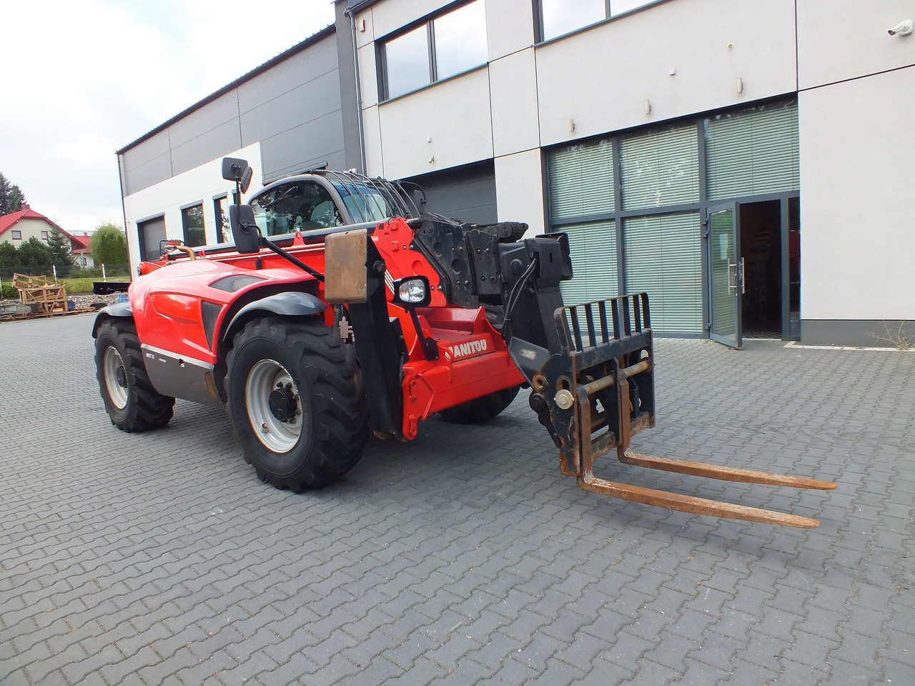 MANITOU MT1840 - Pá carregadora telescópica de Escavadeira: foto 1 MANITOU MT1840 - Pá carregadora telescópica de Escavadeira: foto 1