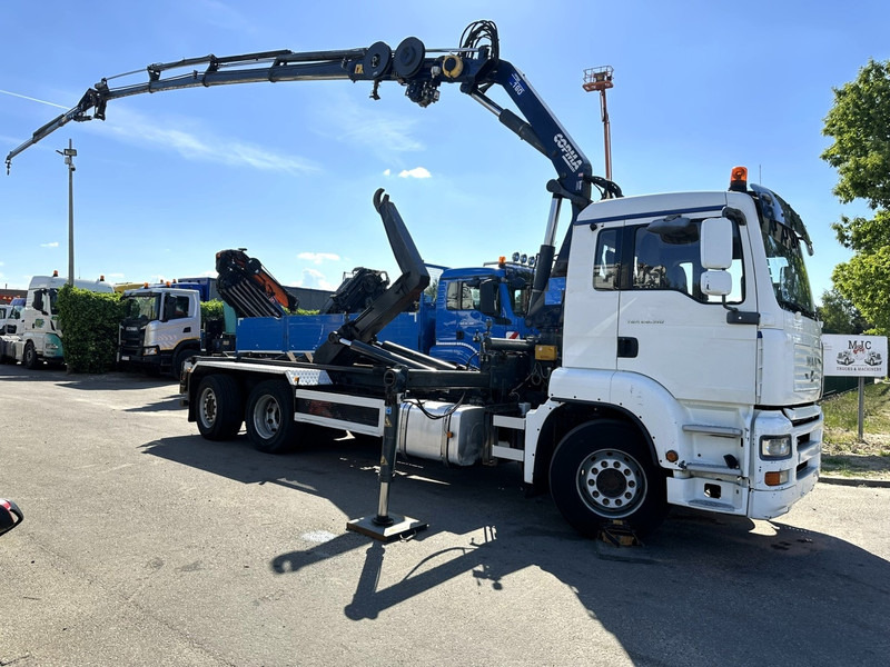 MAN TGA 26.310 6X2 HOOKLIFT + CRANE COPMA 160.4 + JIB J2 + WINCH - RADIO - LIFT + STEERING AXLE - EURO 3 - BE - Caminhão polibenne, Caminhão grua: foto 1 MAN TGA 26.310 6X2 HOOKLIFT + CRANE COPMA 160.4 + JIB J2 + WINCH - RADIO - LIFT + STEERING AXLE - EURO 3 - BE - Caminhão polibenne, Caminhão grua: foto 1