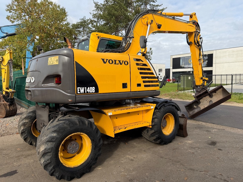 Volvo EW 140 B *FULL HYDR* - BLADE - 10.485h - TILT BUCKET - CE - NL MACHINE - GOOD CONDITION - Escavadeira de rodas: foto 3 Volvo EW 140 B *FULL HYDR* - BLADE - 10.485h - TILT BUCKET - CE - NL MACHINE - GOOD CONDITION - Escavadeira de rodas: foto 3