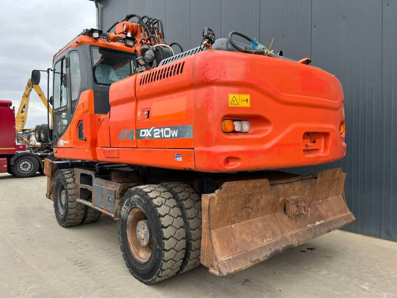 Doosan DX210W - Escavadeira de rodas: foto 2 Doosan DX210W - Escavadeira de rodas: foto 2