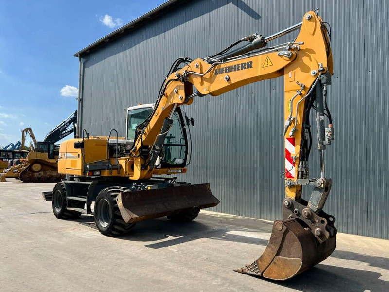 Liebherr A311 Litronic - Escavadeira de rodas: foto 3 Liebherr A311 Litronic - Escavadeira de rodas: foto 3