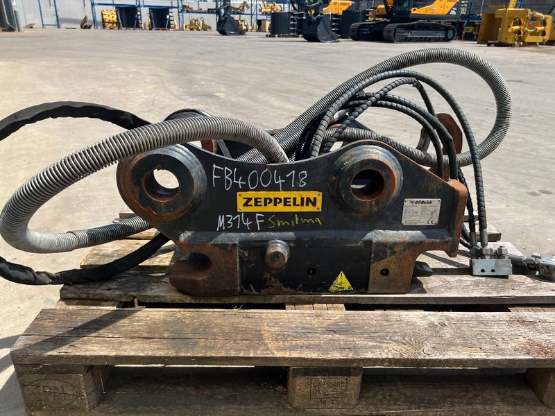 OilQuick OQ65 - M314F / M316F / M318F - Acoplamento rápido de Máquina de construção: foto 4 OilQuick OQ65 - M314F / M316F / M318F - Acoplamento rápido de Máquina de construção: foto 4